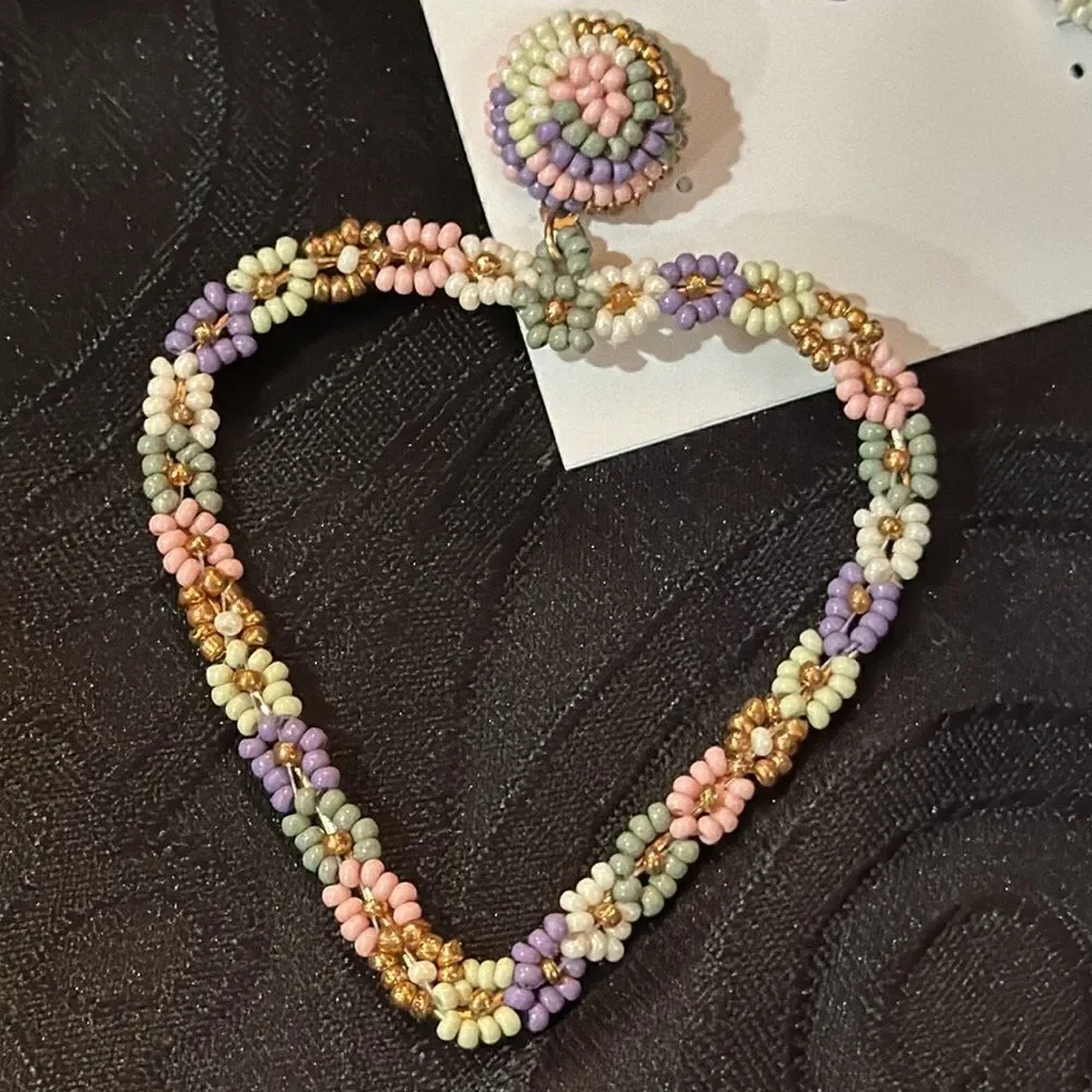 Noir floral heart shaped earrings
